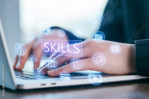 Картината върху платно Developing valuable skills while using a laptop in a modern workspace setting du