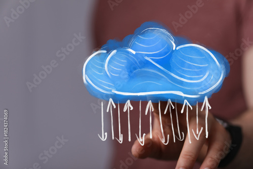 Hand holding digital cloud ...