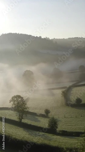 Morning mist covering the hills.