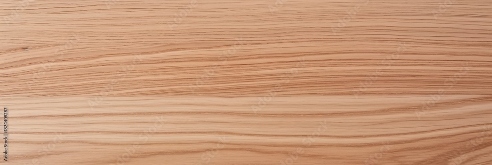 Fototapeta premium A close-up view of smooth, light-colored wood showcasing its natural grain patterns, ideal for design and woodworking projects.