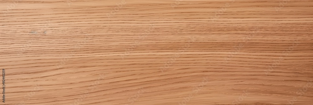 Fototapeta premium A close-up view of a wooden surface showcasing its natural grain patterns and warm, inviting color tones.