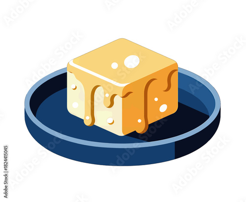Cube of Yellow Cheese with Dripping Caramel on a Plate