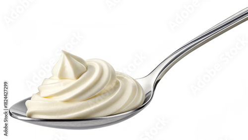 Creamy Spoonful – Smooth White Cream on Silver Spoon
