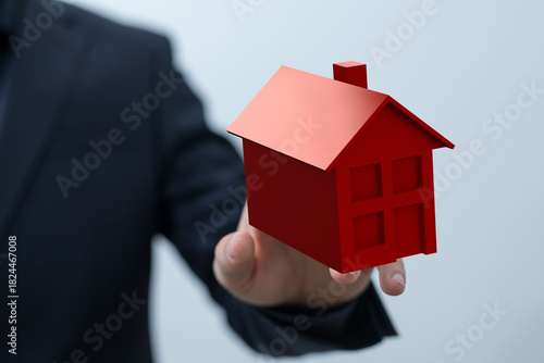 A person's hand holding a s...