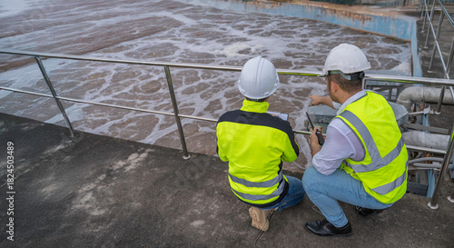 Environmental engineers work at wastewater treatment plants,Water supply engineering working at Water recycling plant for reuse