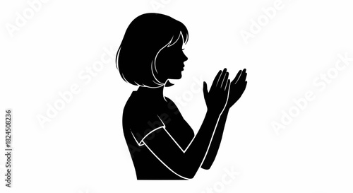 Silhouette of a woman with hands clasped in prayer or meditation.