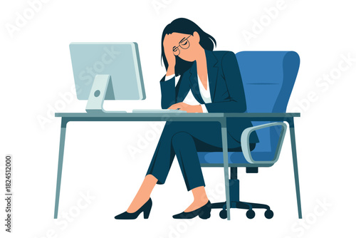 Woman in suit at desk with computer looking stressed and frustrated