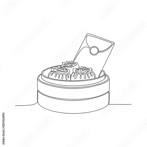 Festive dim sum basket with lucky envelope for holiday takeaways  