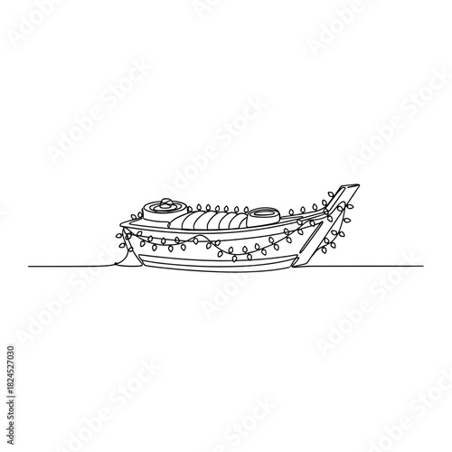 Sushi boat decorated with tiny Christmas lights for holiday celebrations  