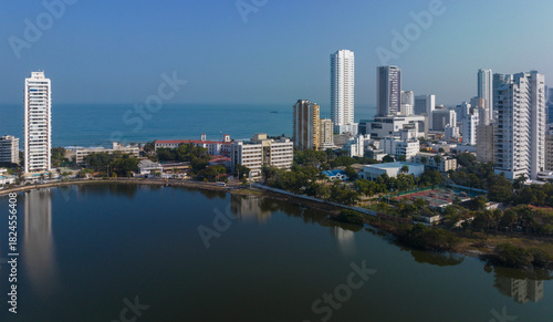 Wallpaper Mural Aerial view of a coastal city skyline with skyscrapers and a reflective waterfront.   Cartagena, Colombia Torontodigital.ca