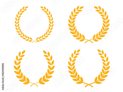 Four golden laurel wreaths arranged on a white background in a pattern