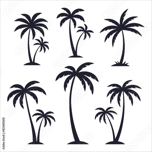 Collection of silhouetted palm trees in various sizes and arrangements