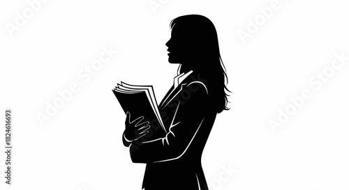 Silhouette of an educated woman holding a book in profile view.