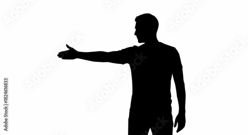 Silhouette of a man extending his hand for a handshake.