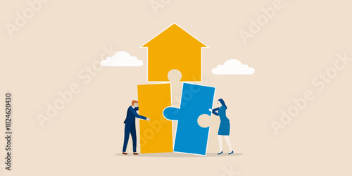 Two business people assembling a house puzzle together