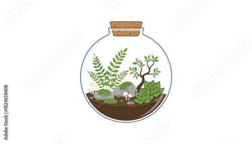 Round glass terrarium with succulents fern and stones.