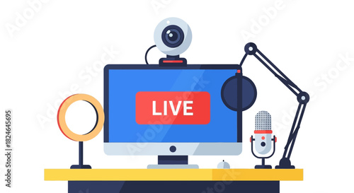 Live streaming setup with computer, webcam, microphone, and ring light for content creation