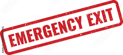 Prominent red rubber stamp displaying the clear safety instruction EMERGENCY EXIT for directional signage