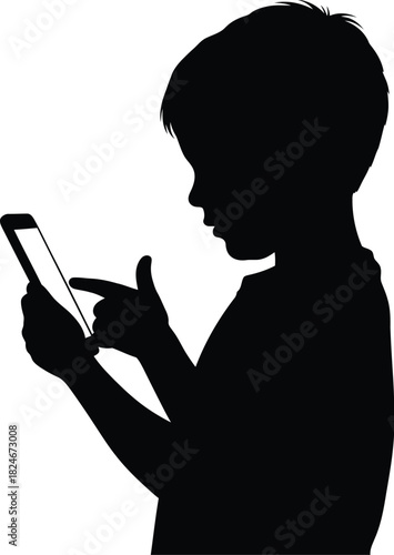 Silhouette of a young child using a smartphone