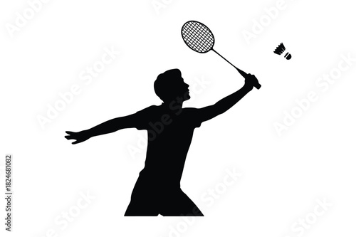 Silhouette of a badminton player serving a shuttlecock