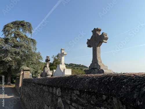Ancient cemetery architecture under bright sky