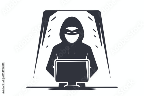 Anonymous figure in hoodie stands before computer screens in a stark, monochromatic tone
