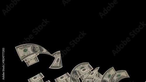 Us dollar bills falling through the air against a black background symbolizing wealth and financial success in a dynamic motion