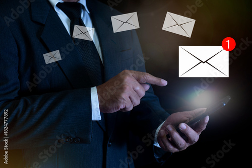 New email notification concept, Businessman using smartphone with email notification for business communication and digital marketing. email newsletter, checking message box, information online.