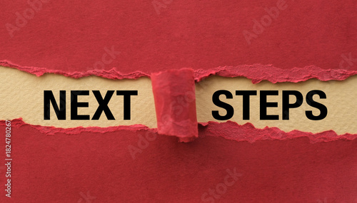 A torn piece of paper with the words Next Steps written on it