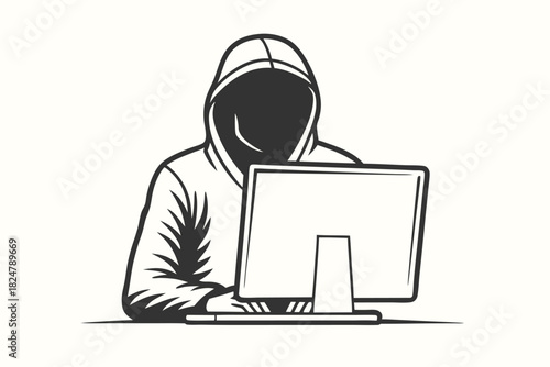 Mysterious hooded figure intensely focuses on the computer, showcasing strong contrast and anonymity