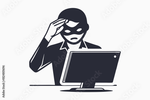 Masked hacker appears stressed while staring at computer screen in a dark silhouette