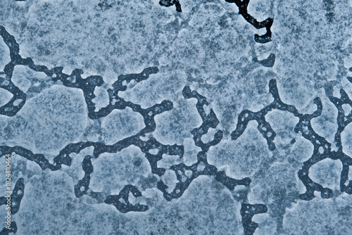 abstract texture of frozen wet dust and dirt on window glass