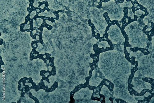 abstract texture of frozen wet dust and dirt on window glass