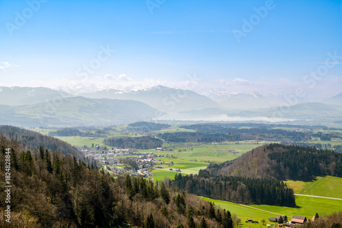View on beautiful swiss landscape and Alps as seen from Albishorn peak near Zurich