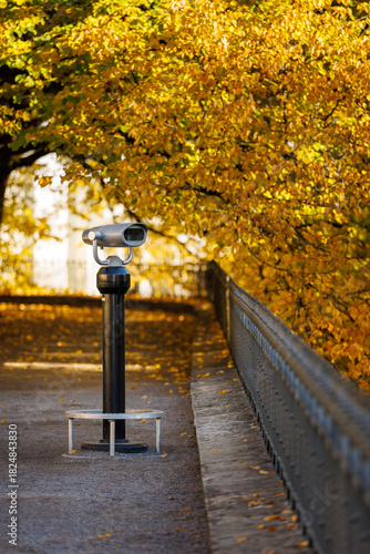 Sight seeing binoculars at a viewing platform in autumn colors in Tallinn, Estonia
