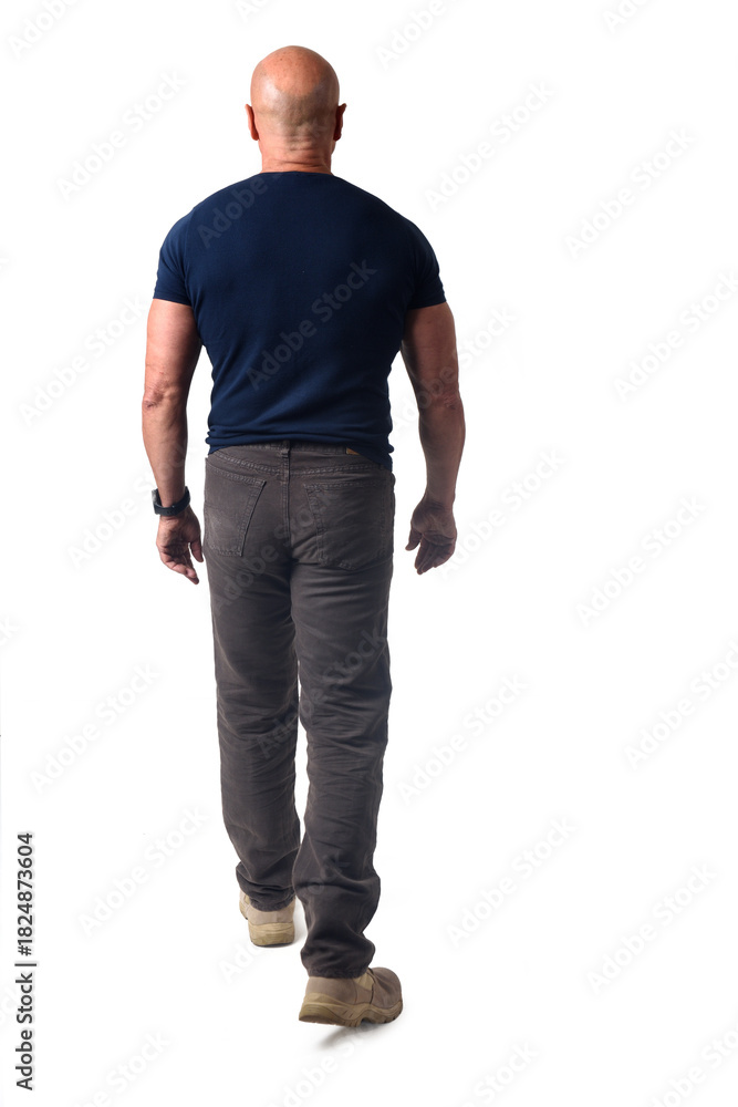 Fototapeta premium back view of a man walking on white background