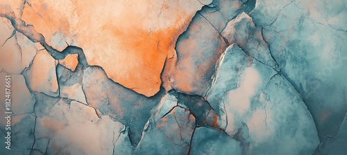 Abstract cracked surface with blue and orange hues creating a textured background art piece