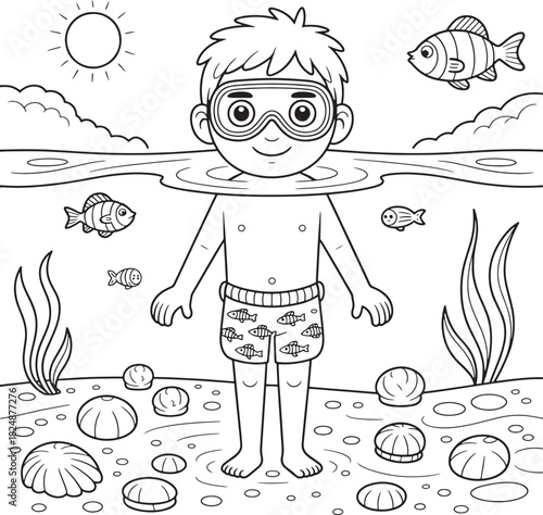 Boy wearing goggles enjoys underwater ocean scene