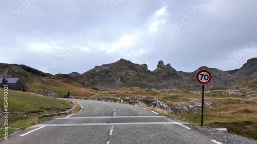 Driving the Col du Pourtalet, France down to Formigal in Spain. Mountain pass in the French Pyrenees massif, symbol of the Tour de France in Bearn, France.