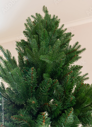 Synthetic Christmas tree branches ready for holiday decoration
