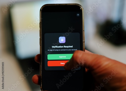 Man Uses Two Factor Authentication to Authorize Application Access Basic Enterprise Information Securtity Concept - 2FA MFA Mobile App