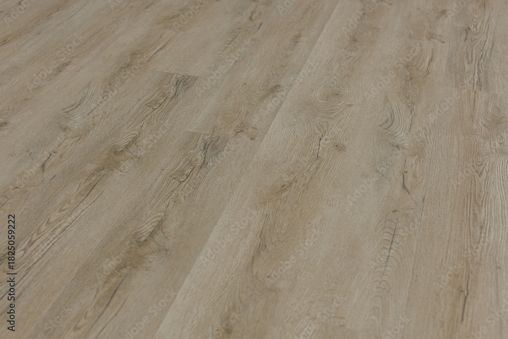 Fototapeta premium Warm natural-light interior scene showing textured wood flooring, captured close-up to highlight grain patterns and surface detail for home renovation and design themes.