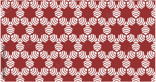 Red and white spiral circular symbols arranged in a repeating geometric pattern for decorative backgrounds.