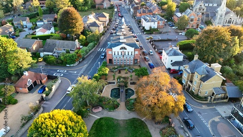 Aerial view of the Stag Theatre stands proudly amidst a tapestry of autumnal hues and architectural harmony, framed by the town's serene roads, Sevenoaks, England, United Kingdom.