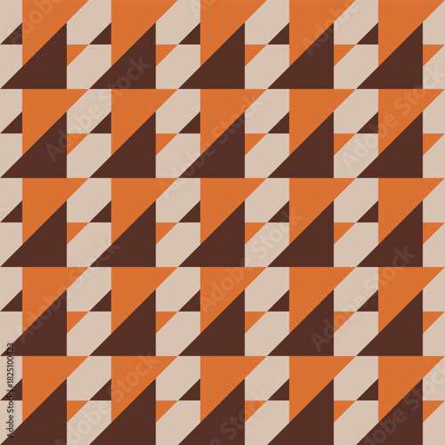 Pattern created from lines of small and large tan and brown triangles on a beige background
