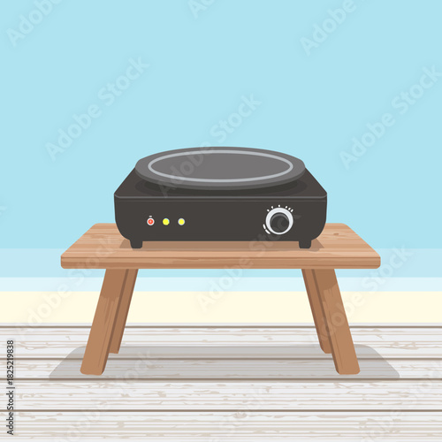 Electric Portable Griddle on a Wooden Table by the Sea