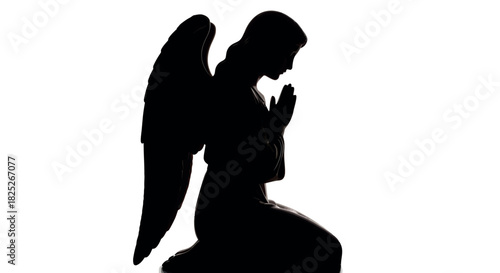 Serene angel kneeling silhouette with folded wings