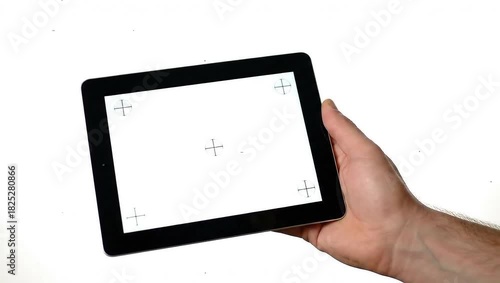 Man hand holding blank tablet with clean white screen isolated on white background perfect for mockup technology display and advertising concept