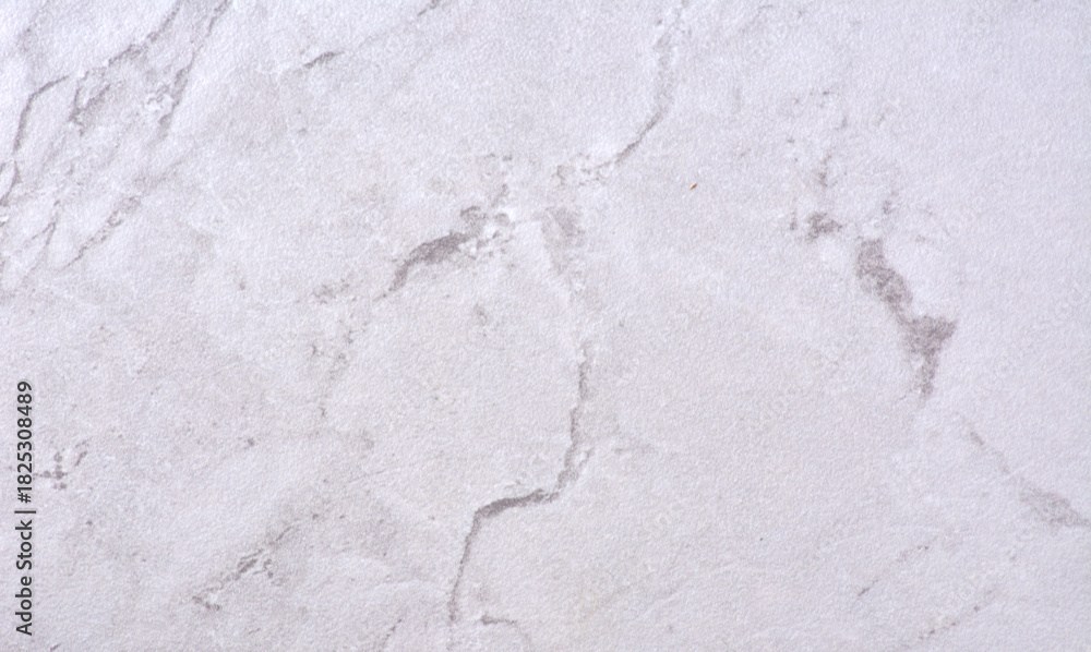 Fototapeta premium White marble, a beautiful natural stone pattern with veins, seamless close-up.