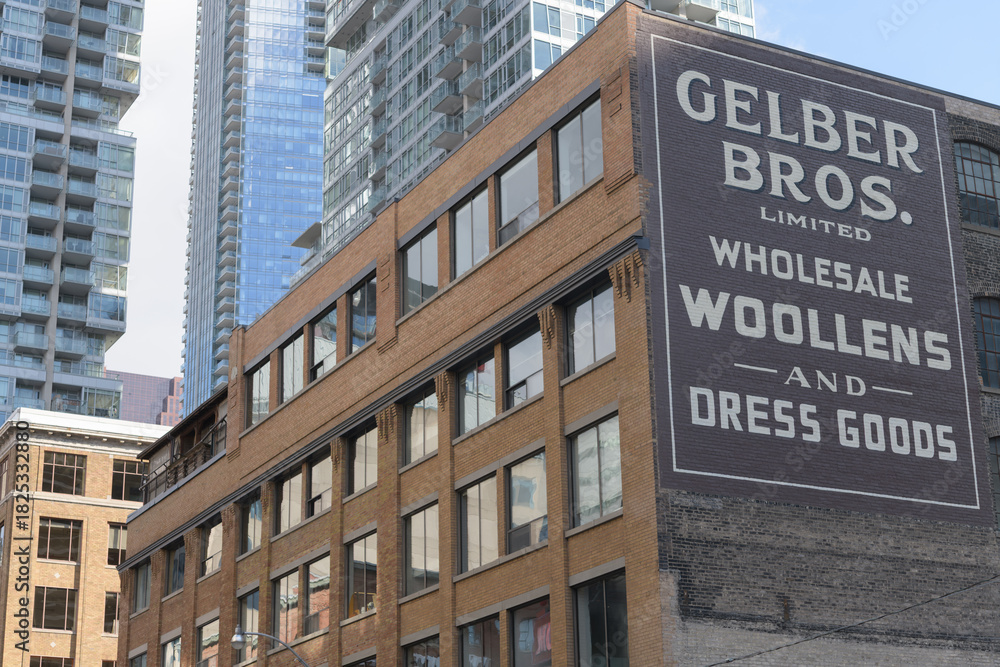 Fototapeta premium The Gelber Bros Building (and sign) located at 217-225 Richmond Street West (at the southwest corner of Duncan Street) in Toronto's Entertainment District